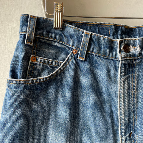 90’s Levi’s Baggy Orange Tab 550 - 32” x 25”
