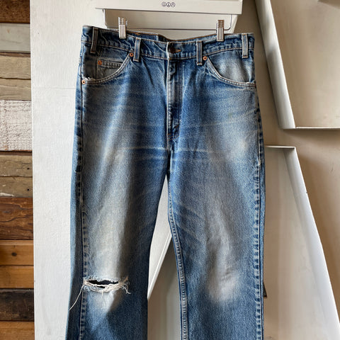 80’s Orange Tab Levi’s 517 - 33” x 28.5”
