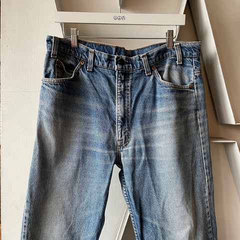 80’s Levi’s Orange Tab 505 - 33” x 27.5”