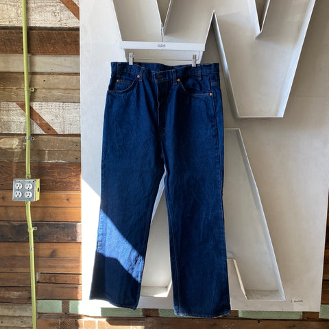 80's Dark Orange Tab Levi’s - 37” x 29”