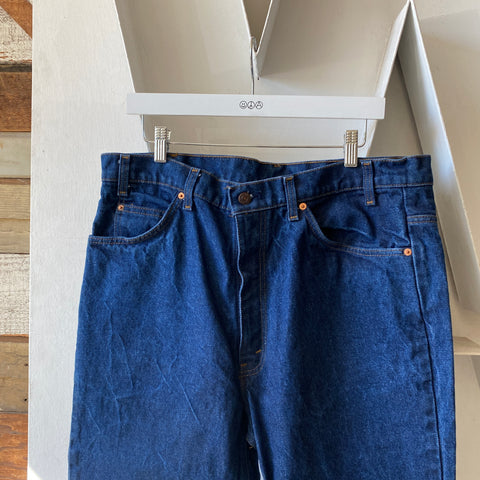 80's Dark Orange Tab Levi’s - 37” x 29”