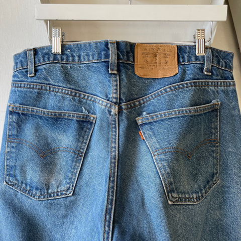 80’s Orange Tab Levi’s - 35” x 32”