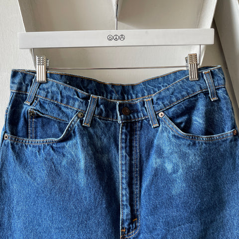 80’s Orange Tab Levi’s - 32” x 28.5”