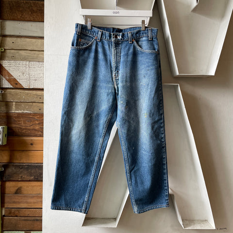 90’s Levi’s Baggy Orange Tab 550 - 32” x 25”