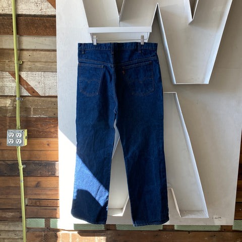 80's Dark Orange Tab Levi’s - 37” x 29”