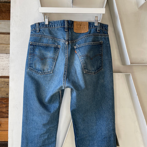 80’s Orange Tab Levi’s - 35” x 32”